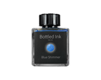 Bottle of bottled ink labeled 'Blue Shimmer' on a white background